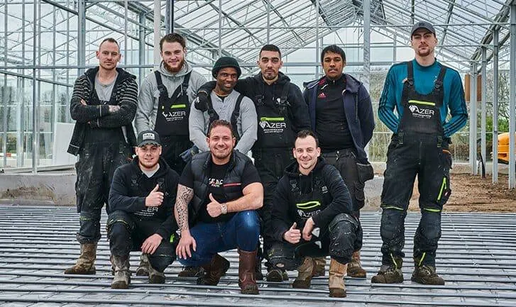 Het team van Azer Vloerverwarming op locatie bij een groot vloerverwarmingsproject